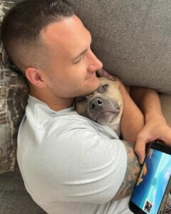 The Heartfelt Secret This Adopted Pitbull Hid From His New Family